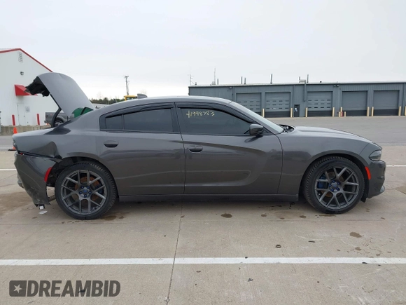 2018 Dodge Charger SXT Plus with VIN 2C3CDXHG0JH217495, listed as a IAAI auction lot 41998783 with 58,247 mi miles and . Bid and sale history available at carsss.com. Image 13.