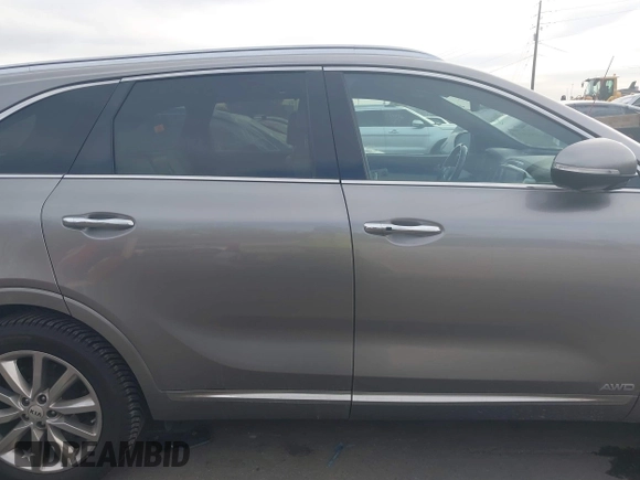 2017 Kia Sorento SX with VIN 5XYPKDA59HG304752, listed as a IAAI auction lot 40931971 with 143,211 mi miles and . Bid and sale history available at DreamBid. Image 14.