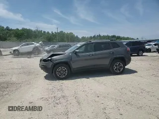 2019 Jeep Cherokee Trailhawk with VIN 1C4PJMBX0KD361639, listed as a Copart auction lot 60549865 with 95,888 mi miles and Salvage title. Bid and sale history available at DreamBid. Image 15.