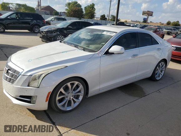 2015 Cadillac ATS Premium with VIN 1G6AE5SX4F0133210, listed as a Copart auction lot 77027604 with 80,682 mi miles and Salvage Title. Bid and sale history available at carsss.com. Image 1.