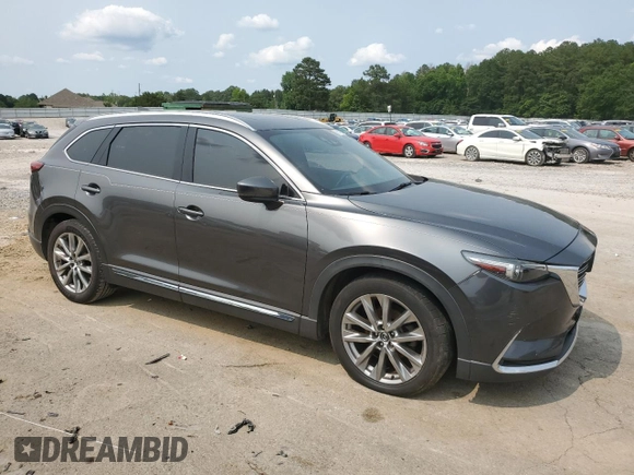2017 Mazda CX-9 Grand Touring z VIN JM3TCADYXH0138805, wystawiony jako Copart lot #59201915 z przebiegiem 147 896 mil mil oraz Czysty tytuł • Clean title. Historia ofert i sprzedaży dostępna na DreamBid. Obrazek 4.