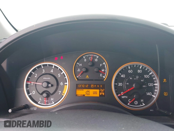 2014 Nissan Titan Pro-4X with VIN 1N6BA0EC1EN515685, listed as a IAAI auction lot 42423258 with 137,012 mi miles and . Bid and sale history available at DreamBid. Image 7.