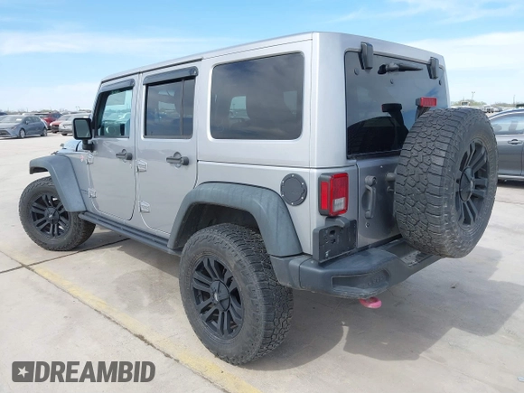 2015 Jeep Wrangler Unlimited Rubicon Hard Rock с VIN 1C4HJWFG6FL762537, выставлен на аукционе IAAI как лот 41792066 с пробегом 125 829 миль миль и . История ставок и продаж доступна на DreamBid. Изображение 3.