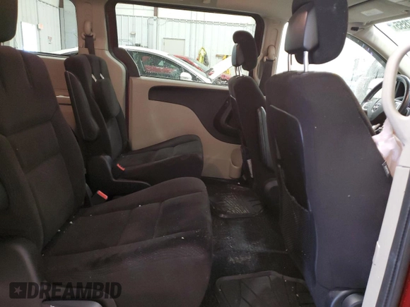 2014 Dodge Grand Caravan SXT z VIN 2C4RDGCG2ER239110, wystawiony jako Copart lot #57247855 z przebiegiem 94 126 mil mil oraz Nie do naprawy. Historia ofert i sprzedaży dostępna na DreamBid. Obrazek 11.