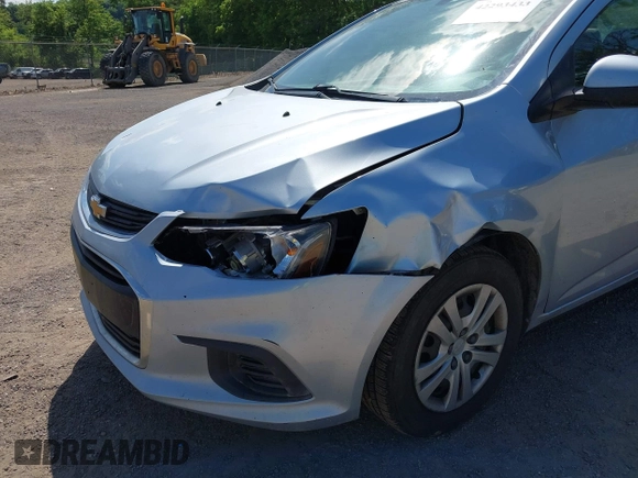 2017 Chevrolet Sonic LS with VIN 1G1JB5SHXH4147759, listed as a IAAI auction lot 42293433 with 167,747 mi miles and . Bid and sale history available at DreamBid. Image 6.