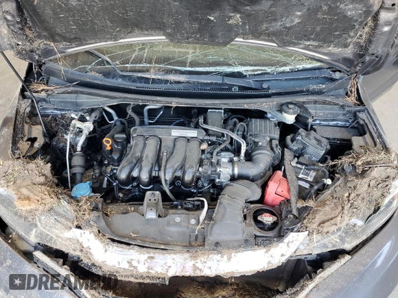 2020 Honda Fit LX z VIN 3HGGK5H46LM710780, wystawiony jako Copart lot #53032525 z przebiegiem 102 541 mil mil oraz Szkoda całkowita • Salvage title. Historia ofert i sprzedaży dostępna na DreamBid. Obrazek 13.