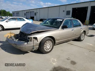2003 Ford Police Interceptor Street Appear with VIN 2FAFP71W73X148322, listed as a Copart auction lot 55573035 with 268,812 mi miles and Salvage title. Bid and sale history available at DreamBid. Image 1.
