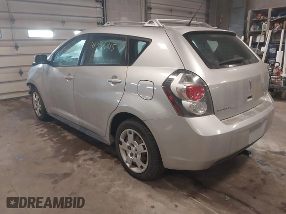 2009 Pontiac Vibe with VIN 5Y2SM67009Z422428, listed as a IAAI auction lot 41356815 with 63,924 mi miles. Bid and sale history available at carsss.com. Image 3.