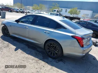 2023 Cadillac CT5 Luxury z VIN 1G6DW5RK7P0146345, wystawiony jako IAAI lot #41862152 z przebiegiem 18 902 mil mil oraz . Historia ofert i sprzedaży dostępna na DreamBid. Obrazek 3.