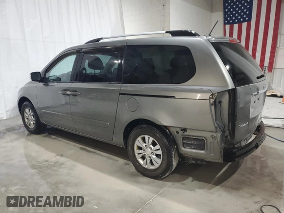 2012 Kia Sedona LX with VIN KNDMG4C79C6433461, listed as a Copart auction lot 71585454 with 164,994 mi miles and Salvage Title. Bid and sale history available at carsss.com. Image 2.