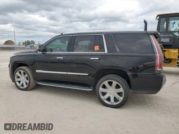 2018 Cadillac Escalade Luxury z VIN 1GYS3BKJ9JR198263, wystawiony jako Copart lot #81517084 z przebiegiem Nie podano mil oraz Szkody całkowita. Historia ofert i sprzedaży dostępna na DreamBid. Obrazek 2.