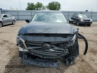 2019 Mazda CX-9 Touring with VIN JM3TCBCY4K0300233, listed as a Copart auction lot 59424225 with 50,337 mi miles and Salvage title. Bid and sale history available at DreamBid. Image 5.