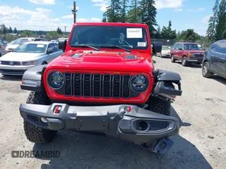 2025 Jeep Wrangler Rubicon with VIN 1C4PJXFN4SW573748, listed as a IAAI auction lot 42660183 with 763 mi miles and . Bid and sale history available at DreamBid. Image 12.
