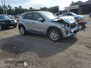 2015 Mazda CX-5 Touring with VIN JM3KE2CY7F0435914, listed as a Copart auction lot 61885704 with 0 mi miles and Salvage Title. Bid and sale history available at carsss.com. Image 4.