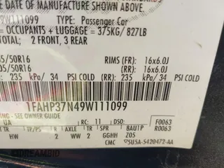 2009 Ford Focus SEL with VIN 1FAHP37N49W111099, listed as a IAAI auction lot 41502124 with 183,401 mi miles. Bid and sale history available at carsss.com. Image 9.