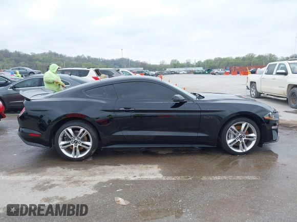 2021 Ford Mustang GT z VIN 1FA6P8CF2M5149643, wystawiony jako IAAI lot #41981794 z przebiegiem 57 345 mil mil oraz . Historia ofert i sprzedaży dostępna na DreamBid. Obrazek 13.