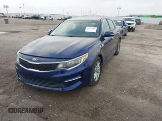 2018 Kia Optima S with VIN 5XXGT4L33JG214404, listed as a IAAI auction lot 41517699 with 91,740 mi miles and . Bid and sale history available at DreamBid. Image 2.
