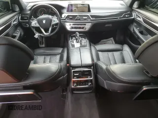 2016 BMW 7 Series 750i z VIN WBA7F0C56GGL99533, wystawiony jako Copart lot #59091045 z przebiegiem 124 624 mil mil oraz Czysty tytuł • Clean title. Historia ofert i sprzedaży dostępna na DreamBid. Obrazek 8.