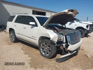 2015 GMC Yukon Denali with VIN 1GKS2CKJ3FR568729, listed as a IAAI auction lot 41741987 with 154,729 mi miles. Bid and sale history available at carsss.com. Image 1.