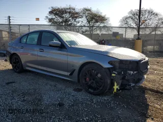 2023 BMW 5 Series 540i with VIN WBA53BJ06PWY00135, listed as a Copart auction lot 46426125 with 49,024 mi miles and Salvage title. Bid and sale history available at DreamBid. Image 4.
