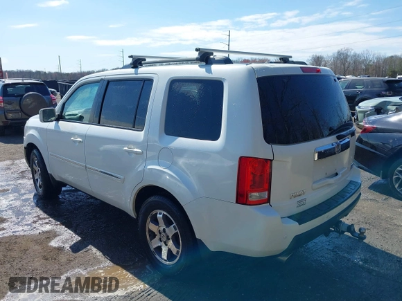 2011 Honda Pilot Touring with VIN 5FNYF4H96BB014095, listed as a IAAI auction lot 41794052 with 202,440 mi miles and . Bid and sale history available at DreamBid. Image 3.