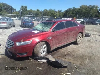2014 Ford Taurus SEL with VIN 1FAHP2E87EG139913, listed as a IAAI auction lot 40216089 with 95,336 mi miles and . Bid and sale history available at carsss.com. Image 2.