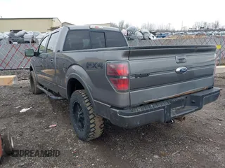 2011 Ford F-150 XLT with VIN 1FTFW1ET4BFC23725, listed as a IAAI auction lot 42018932 with 323,160 mi miles. Bid and sale history available at carsss.com. Image 3.