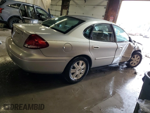 2006 Ford Taurus with VIN 1FAHP56U46A162809, listed as a Copart auction lot 60476125 with 95,542 mi miles and Salvage title. Bid and sale history available at DreamBid. Image 3.