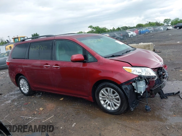 2015 Toyota Sienna XLE with VIN 5TDYK3DC9FS569714, listed as a IAAI auction lot 42297410 with 114,802 mi miles and . Bid and sale history available at DreamBid. Image 14.