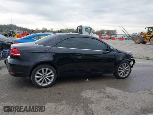 2014 Volkswagen Eos Komfort with VIN WVWBW8AH4EV007229, listed as a IAAI auction lot 41894160 with 66,984 mi miles and . Bid and sale history available at DreamBid. Image 13.