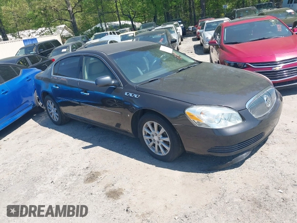 2009 Buick Lucerne CXL with VIN 1G4HD57M59U122626, listed as a IAAI auction lot 42004989 with 184,026 mi miles. Bid and sale history available at carsss.com. Image 1.