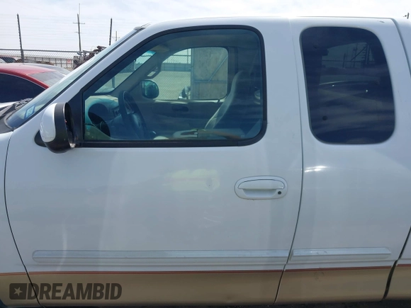 1999 Ford F-150 with VIN 1FTZX1720XKB31945, listed as a IAAI auction lot 42123984 with 187,766 mi miles and . Bid and sale history available at DreamBid. Image 14.