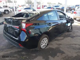 2021 Toyota Prius L Eco with VIN JTDKAMFU2M3134178, listed as a IAAI auction lot 41975477 with 26,936 mi miles. Bid and sale history available at carsss.com. Image 4.