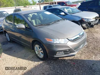 2013 Honda Insight EX with VIN JHMZE2H74DS006608, listed as a IAAI auction lot 42789221 with 113,112 mi miles and . Bid and sale history available at DreamBid. Image 1.