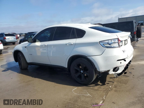2014 BMW X6 xDrive35i with VIN 5UXFG2C57E0C44228, listed as a Copart auction lot 46574765 with 111,001 mi miles and Salvage Title. Bid and sale history available at carsss.com. Image 2.
