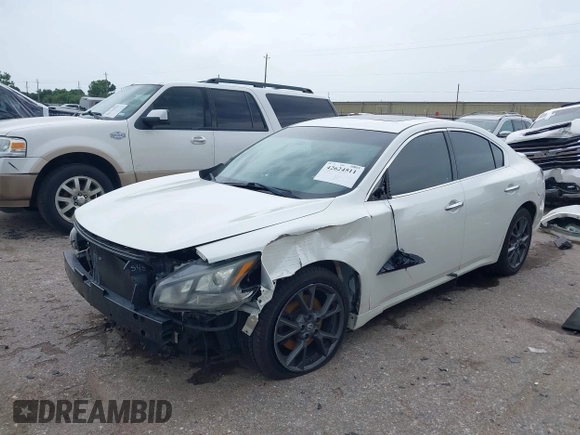 2014 Nissan Maxima S with VIN 1N4AA5AP6EC908751, listed as a IAAI auction lot 42624511 with 141,544 mi miles and . Bid and sale history available at DreamBid. Image 2.