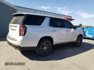 2023 Chevrolet Tahoe Premier with VIN 1GNSCSKD6PR119132, listed as a Copart auction lot 74594664 with 27,716 mi miles and Salvage title. Bid and sale history available at DreamBid. Image 3.