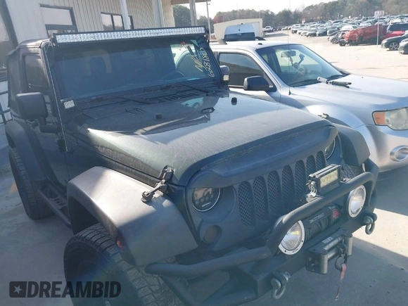 2011 Jeep Wrangler Rubicon with VIN 1J4BA6D10BL628180, listed as a IAAI auction lot 41711065 with 155,940 mi miles and . Bid and sale history available at carsss.com. Image 1.