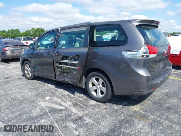2012 Toyota Sienna with VIN 5TDZK3DC8CS190719, listed as a IAAI auction lot 41983695 with 68,377 mi miles and . Bid and sale history available at DreamBid. Image 3.