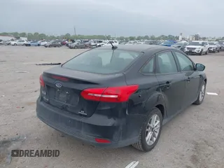 2016 Ford Focus SE with VIN 1FADP3F21GL305027, listed as a IAAI auction lot 41930646 with 106,127 mi miles and . Bid and sale history available at DreamBid. Image 4.