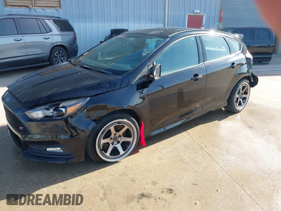 2018 Ford Focus ST with VIN 1FADP3L95JL332577, listed as a IAAI auction lot 41748222 with 73,491 mi miles and . Bid and sale history available at DreamBid. Image 2.