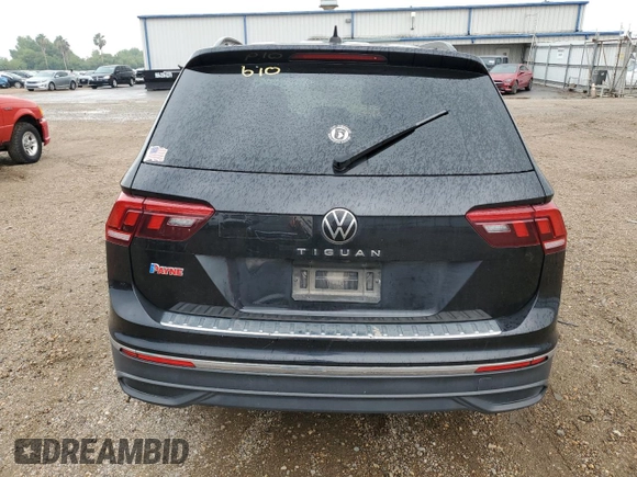 2023 Volkswagen Tiguan S with VIN 3VVRB7AX0PM038326, listed as a Copart auction lot 56350825 with 50,013 mi miles and Salvage title. Bid and sale history available at DreamBid. Image 6.