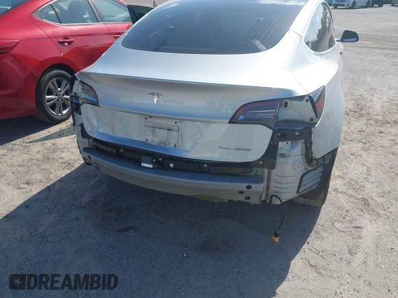2018 Tesla Model 3 Long Range Battery with VIN 5YJ3E1EB7JF104356, listed as a IAAI auction lot 41936961 with 90,932 mi miles and . Bid and sale history available at DreamBid. Image 6.