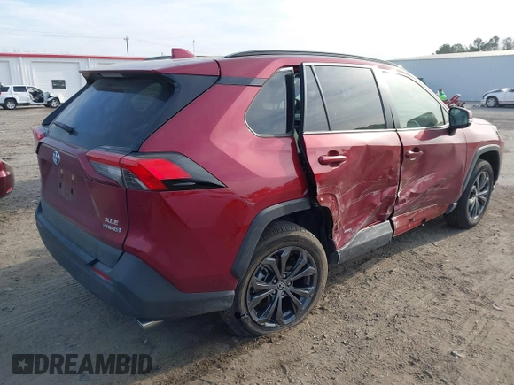 2023 Toyota RAV4 Hybrid XLE Premium z VIN JTMB6RFV8PD114927, wystawiony jako IAAI lot #41844127 z przebiegiem 14 582 mil mil oraz . Historia ofert i sprzedaży dostępna na DreamBid. Obrazek 4.