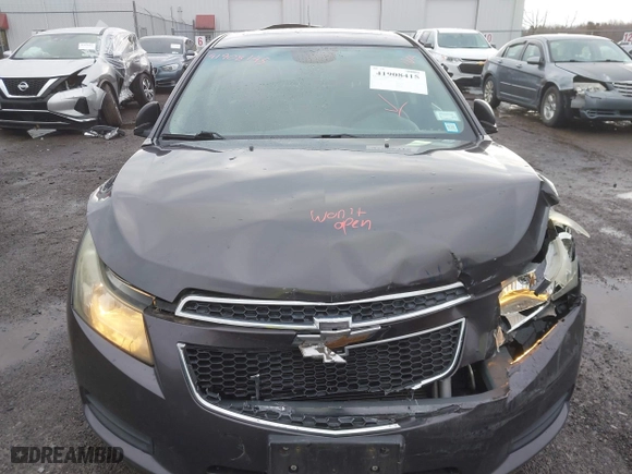 2011 Chevrolet Cruze LT w/2LT with VIN 1G1PG5S90B7154911, listed as a IAAI auction lot 41908415 with 172,826 mi miles. Bid and sale history available at carsss.com. Image 6.