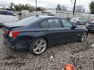 2015 BMW 7 Series 750i xDrive with VIN WBAYB6C56FD965841, listed as a Copart auction lot 48748145 with 102,305 mi miles and Salvage Title. Bid and sale history available at carsss.com. Image 3.