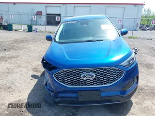 2024 Ford Edge SEL z VIN 2FMPK4J96RBB00933, wystawiony jako IAAI lot #42393326 z przebiegiem 28 710 mil mil oraz . Historia ofert i sprzedaży dostępna na DreamBid. Obrazek 12.