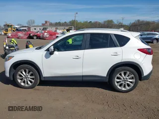 2013 Mazda CX-5 Grand Touring with VIN JM3KE4DE3D0156957, listed as a IAAI auction lot 42085443 with 146,990 mi miles. Bid and sale history available at carsss.com. Image 14.