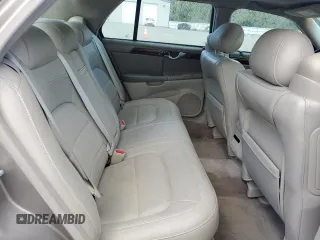 2004 Cadillac DeVille DTS z VIN 1G6KF579X4U212415, wystawiony jako Copart lot #58005555 z przebiegiem 97 663 mil mil oraz Tytuł czysty. Historia ofert i sprzedaży dostępna na DreamBid. Obrazek 10.