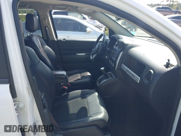 2016 Jeep Compass Latitude with VIN 1C4NJCEB3GD655531, listed as a IAAI auction lot 40418301 with 159,670 mi miles. Bid and sale history available at carsss.com. Image 5.
